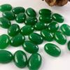 Atacado de fábrica fornecimento de comércio exterior anel oval de jade malaio verde picante superfície pedra nua DIY mesa de cravação manual