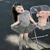 Conjunto para Meninas 2026 Verão Novo Estilo Top Colete com Laço Infantil Conjunto de Duas Peças Saia Xadrez Estilosa para Bebê