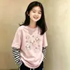 Camiseta de manga larga para niña 2026 nuevo estilo para niños mayores, elegante top de dos piezas simulado para primavera y otoño, camiseta básica de algodón puro para otoño