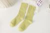 Calcetines blancos de mujer, medias de algodón japonés de moda para primavera y otoño, calcetines de media pantorrilla de color liso, serie Candy al por mayor