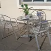 Directo de fábrica mesa y silla de aleación de aluminio metálico para exteriores, patio, jardín, impermeable, protector solar, mesa redonda, silla de aluminio, juego de cuatro piezas