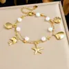 Pulsera Colgante Nueva Estrella de Mar Delfín Concha Serie Oceánica Estilo Playa Acero Inoxidable Perla Pulsera en Capas
