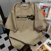 Camiseta Informal Suelta de Verano 2025 de Longitud Media con Cuello Redondo y Mangas Cortas para Hombres y Mujeres Parejas Estilo Preppy Casual Retro Tops