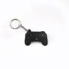 Simulação de fábrica Nintendo console de videogame handle chaveiro switch pingente mini PS4 Borracha macia Pingente criativo