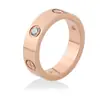 Moda europea y americana Anillo de acero de titanio con circonita de tornillo cruzado para hombre, oro rosa, acero inoxidable, joyería, ventas directas de fábrica