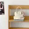 2026 Estilo Coreano Nicho Simple Bolso Tote tipo concha para el día a día Moda Transfronteriza Sensación de Alta Gama Bolso de Hombro para Mujer