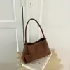 Bolsa de ombro estilosa em trama Shuai Mi Jia para mulheres, nova moda outono 2026, bolsa de mão pequena única casual para trabalho e deslocamento