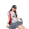 Conjunto de moda de verano 2026 para mujer: Camiseta de manga corta bordada estilo coreano con dibujos animados y falda de cuadros tipo pastel con cintura elástica