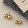 Pendientes de perla color champán de alta calidad estilo francés, diseño de nicho, pendientes de alta gama para mujer, joyería elegante nueva de 2024