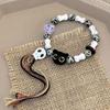 Pulseira de Corda Trançada Cerâmica Gato Caveira Design de Nicho Feminino Doce Cool Estilo Chinês Pulseira Colorida com Borla
