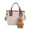 Bolso de Mano de Nicho Transfronterizo para Mujer Verano 2026 Nueva Moda Lunares Bolso Cubo de Hombro Único Bolso Cruzado para Viaje
