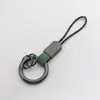 2026 Nuevo Modelo Llavero de Cuero para Coche Colgante Lanyard Simple de Alta Gama Accesorios de Regalo Pequeños Venta al por Mayor
