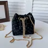 Bolsa de ombro transversal estilo coreano com poá, tendência 2026, com cordão, moda simples, elegante, com corrente, modelo balde