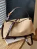 Bolsa casual de nicho para mulheres, novidade outono de 2026, bolsa transversal vintage de cor sólida, bolsa de ombro e de axila personalizada para o dia a dia