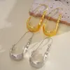 Brincos de gancho em U irregulares exagerados em estilo europeu e americano, brincos de metal de moda personalizados transfronteiriços, brincos de nicho de alta qualidade e resistentes