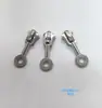 No. 5 Metal Platino Deslizador Inferior Tirador Bloqueo Tirador Caracol Bolsa con Cremallera Cabezal de Cremallera para el Hogar en stock Al por mayor