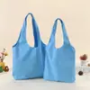 Suministro directo transfronterizo de bolsas de lona de colores lisas listas para usar, bolsas de lona tipo tote multicolor, bolsos de hombro de gran capacidad para el trabajo