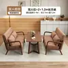 Sillas de sofá de madera maciza estilo nórdico, muebles de ocio para balcón, juegos populares para cafeterías y hoteles, y mesas y sillas de recepción para reuniones y encuentros