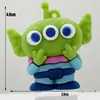 Llavero Colección Animales de Dibujos Animados Muñeco de Goma Blanda 3D Colgante Pequeño Extraterrestre de Tres Ojos Buzz Lightyear Colgante Oso Fresa