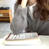 Cárdigan de punto con paneles grandes de hilo de núcleo para mujer, nuevo estilo otoño e invierno, adecuado como capa interior o prenda exterior