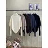 Suéter de cuello alto diseño irregular manga murciélago holgado cubre trasero tejido casual estilo perezoso negro
