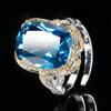 Productos explosivos populares Joyería Zhuang Shengsheng cobre chapado en oro simulación corindón rojo cristal azul puntiagudo anillo lazo 12*16