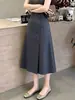 Elegante saia midi cinza de corte evasê com abotoamento duplo para mulheres, nova coleção outono 2026, versátil e estilosa para o trabalho e o dia a dia