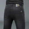 Jeans de alta calidad para hombre de Hong Kong, otoño e invierno 2026, negros y grises, elásticos, corte slim, pantalones largos casuales de alta gama
