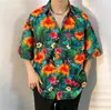 Camisa hawaiana de manga corta con estampado floral para hombre, estilo Hong Kong, holgada, de verano, moderna, informal, con mangas tres cuartos.