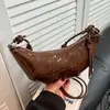 Bolsa Saco Transfronteiriça 2026 Verão Nova Bolsa Feminina Moda Design de Nicho Elegante Bolsa de Ombro Simples Retrô Bolsa Transversal