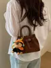 Bolso de Mano Cuadrado Pequeño Casual Simple Estilo Coreano para Mujer Moda Nueva Primavera 2026 Bolso de Hombro Cruzado de Textura de Alta Gama