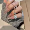 Collar para mujer con colgante bañado en plata con figura de Buda de calcedonia blanco hielo, diseños de hoja y calabaza, ágata y jade de Maitreya