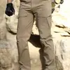2026 Verão Masculino Novo Versátil Outdoor Solto Calças Esportivas Cor Sólida Estilo Militar Calças de Trabalho Atacado