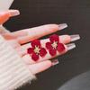 Pendientes de botón con diseño de flores rojas de moda 2024, nuevos y modernos, estilo francés retro, de gran sentido, nicho, pendientes elegantes y únicos.