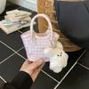 Bolso de nicho para mujer súper popular para comercio exterior, nuevo bolso cruzado versátil 2026, bolso de cubo mini de moda a cuadros