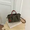 Bolso de Hombro Simple Shuai Mi Jia 2026 Nuevo Estilo Coreano Moderno Fresco Dulce Bolso de Mano para Viaje Casual Bolso Cruzado