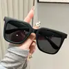 Gafas de sol sin montura en forma de cruz con incrustaciones de diamantes para mujer, a la moda y de alta gama, con lentes cortados, estilo moderno