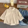 Camisa para Niños Primavera y Otoño 2026 Nuevo Estilo Niños Pequeños Color Sólido Manga Larga Versátil Algodón Puro Cuello Solapa Top Ropa Exterior