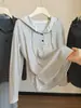 Camiseta de punto de manga larga a rayas con capucha estilo coreano para mujer, nuevo modelo otoño 2026, chaqueta top casual holgada versátil de moda