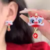 Brincos Festivos de Leão Vermelho e Fera para Meninas 2025 Novo Estilo Popular Boa Sorte Brincos Versáteis de Ano Novo
