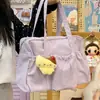 El nuevo modelo de este bolso de un solo hombro es un bolso de mano de gran capacidad para estudiantes universitarios, simple, elegante y casual, una bolsa tote para laptop para mujeres