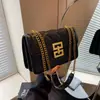 Bolsa de moda transfronteiriça 2026, design de nicho versátil, bolsa de corrente matelassada, bolsa transversal popular, bolsa quadrada pequena