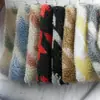Jacquard de Lana de Cordero Flor Colorida Tamaño Círculo Leopardo Estampado Leopardo Jacquard Lana de Cordero Otoño e Invierno Ropa de Terciopelo de Cordero Tela para Juguetes