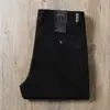 Estación europea otoño e invierno grueso caqui avanzado negocios sarga algodón elástico mediana edad holgado recto casual pantalones para hombre