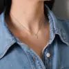 Collar de Acero de Titanio con Cruz de Circonita de Moda Europea y Americana de Lujo Ligero para Mujer, Accesorio de Nicho con Incrustación Completa de Diamantes, Cadena de Clavícula Elegante de Gama Alta