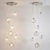 Lámpara de araña para hueco de escalera, nuevo estilo francés crema, lujo ligero, apartamento de alta gama, villa, lámpara de araña larga giratoria