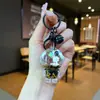 Tiktok Ouro Preto Astronauta Criativo Areia Movediça com Óleo Chaveiro Flutuante Fresco Astronauta Planeta Pingente Casal
