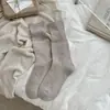 Meias cinzas femininas outono novo estilo coreano cor sólida versátil meias de cano médio estilo japonês malha texturizada punho folgado meias amassadas