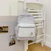 Mochila con estampado de rayas estilo coreano, moderna y versátil, mochila de nicho estilo Ins para estudiantes de secundaria, preparatoria y universidad