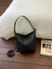 Bolso de cubo de nicho de alta gama transfronterizo para mujer, nuevo bolso de hombro tejido estilo vintage para el trabajo y los desplazamientos